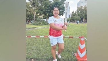 Hidilyn carries the flame