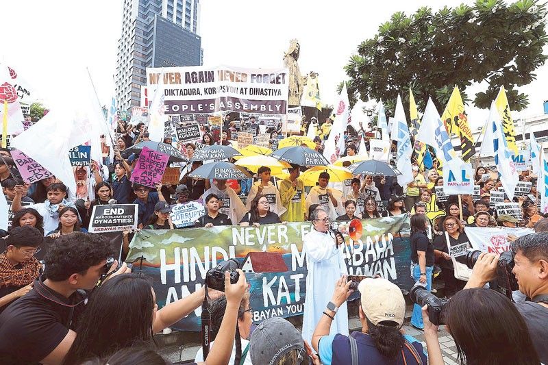 Groups mark martial law with corruption protest