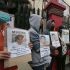 Relatives hold photos of some missing cockfighting aficionados (sabungeros) from Manila and Laguna, as they sought help from Malacañang, Jan. 31.