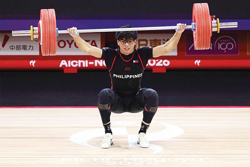 Delos Santos bumuhat ng bronze at bagong record