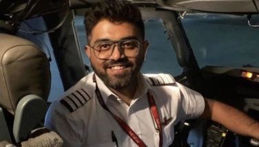This handout photograph released by the Israel's Foreign Ministry on September 30, 2026 shows Indian pilot Smit Machchhar, the captain of flydubai flight FZ 1073.