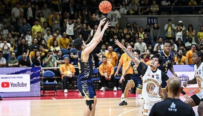 Jumamoy trey lifts NU over UST