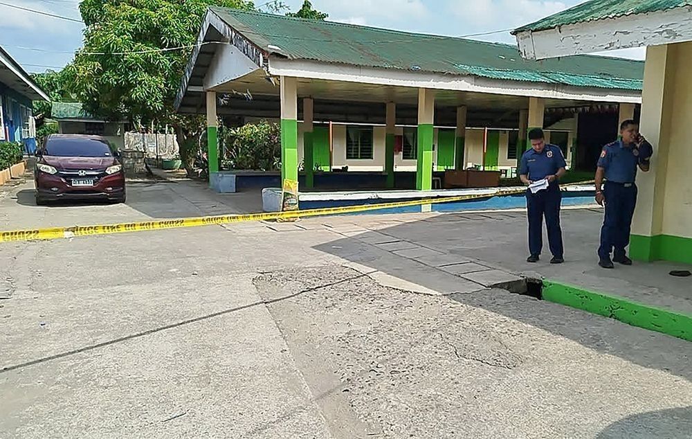 Cop dismissed over Tacloban school shooting
