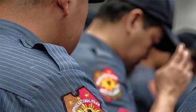 Bulacan cop dismissed for assault on partner