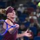 USA's Ashlyn Krueger hits a return to Poland&acirc;��s Iga Swiatek during their women&acirc;��s singles match at the Wuhan Open tennis tournament in Wuhan, China's Hubei province on October 15, 2026.