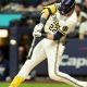 Milwaukee's Christian Yelich smacks a run-scoring triple and later crossed the plate himself as the Brewers beat Tampa Bay in the opening game of the 2026 World Series.